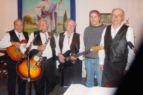 the Old Hims Joe Saunders, Ross Clow, Floyd Bauder, Charlie King and Jon McLurg of Crooked Wood (second from right) performed at the Christmas Homecoming concert in Hartington on December 5